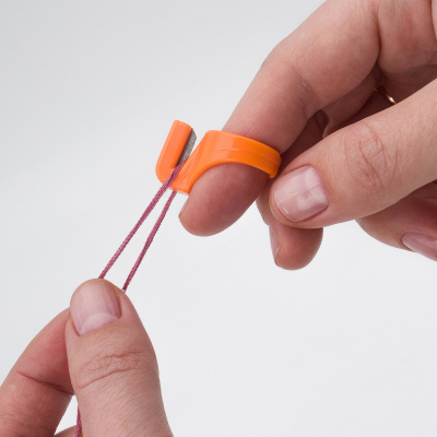 4AL-002 Наперсток-кольцо для обрезки ниток, пластик, упак/5шт